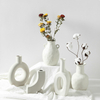 Customized round home decor cheap new model modern geometric ceramic flower vases porcelain vase